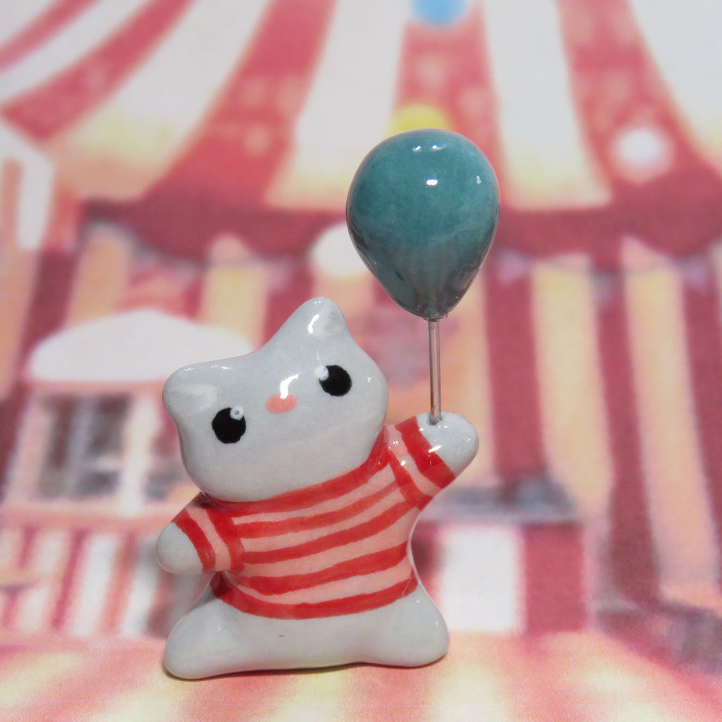 Nipsy has a Blue Balloon
