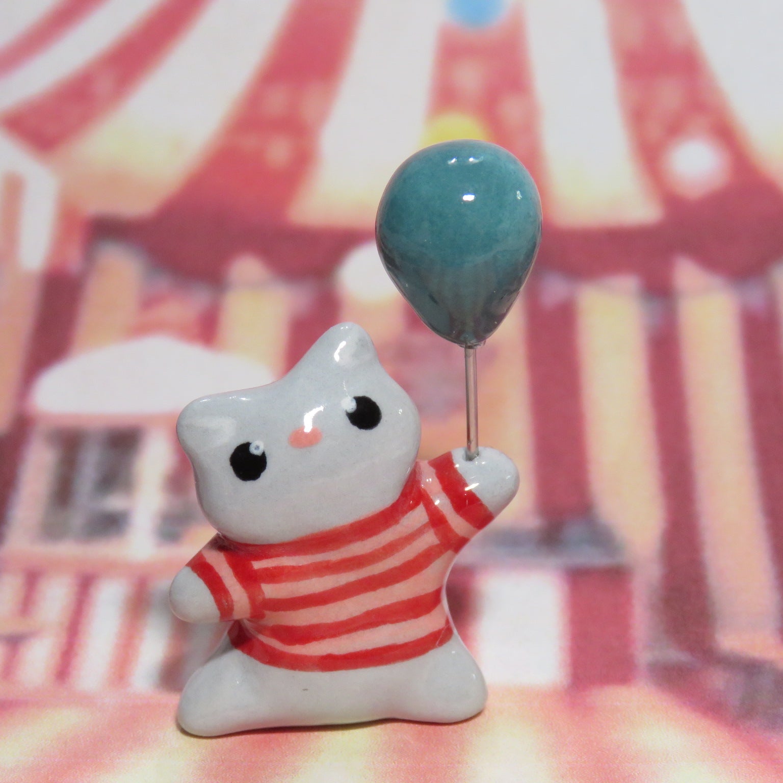 Nipsy has a Blue Balloon