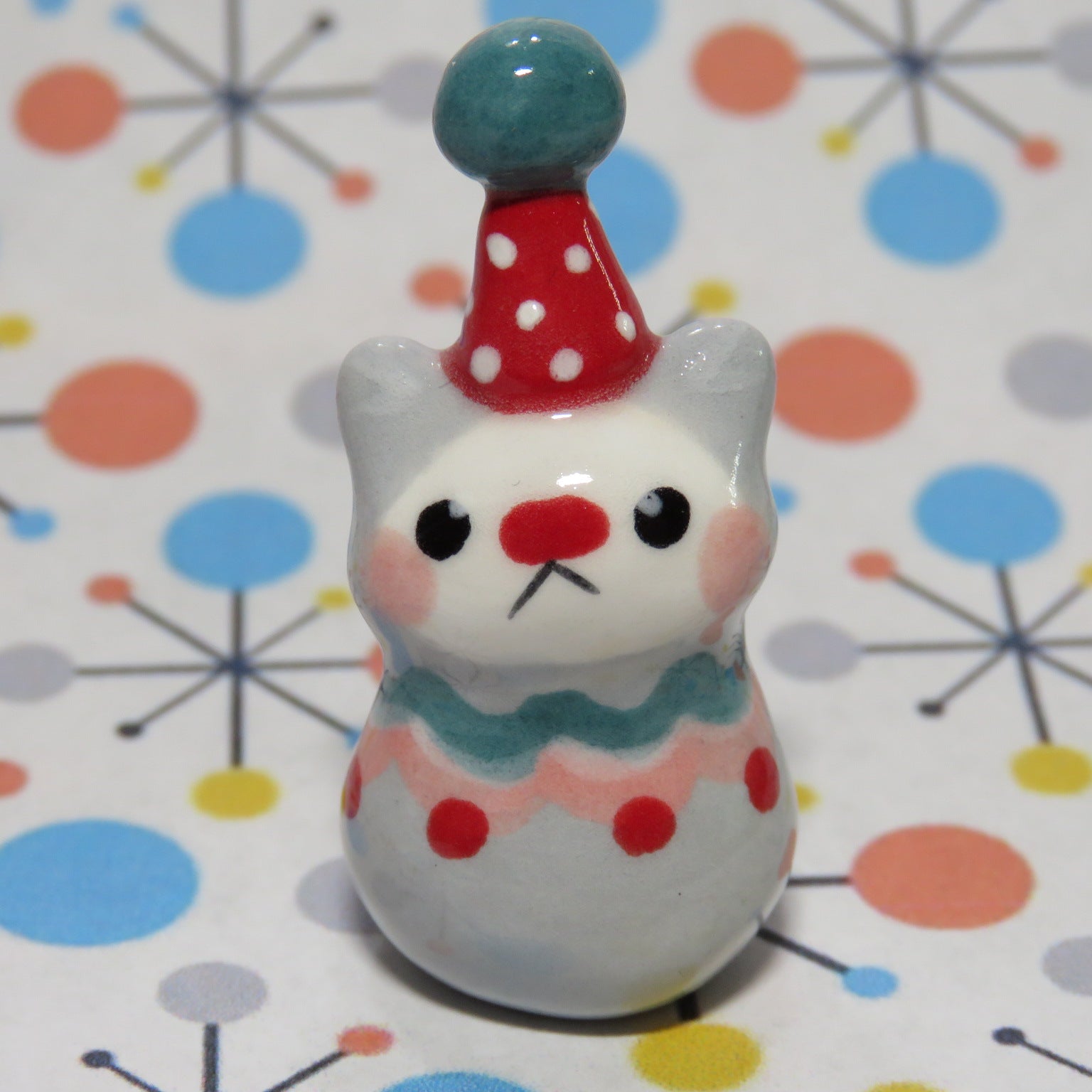 Mittens as a Clown